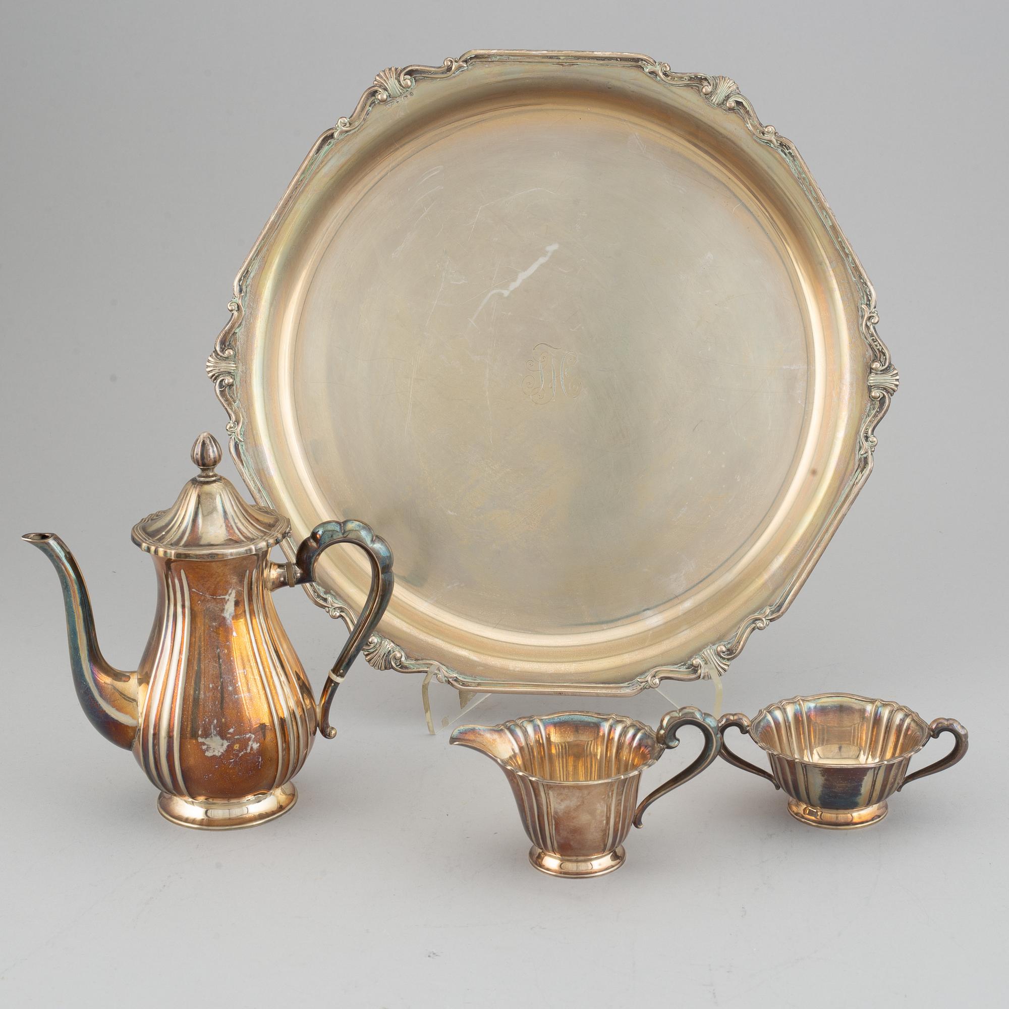 A silver coffee set and a tray, maker's mark Carl Hoff, Helsingborg, Sweden 1934 and 1933,