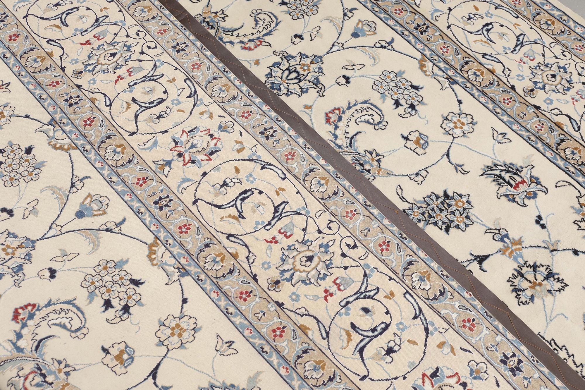 A carpet, Nain Part Silk, S.K 9 LAA, 340 x 250 cm.