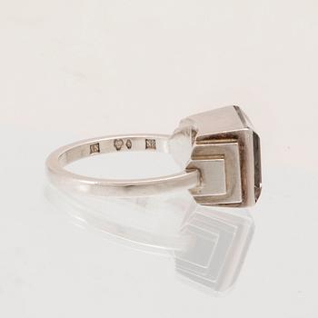 A silver ring set with a step-cut rock quartz crystal by Wiwen Nilsson Lund 1939.