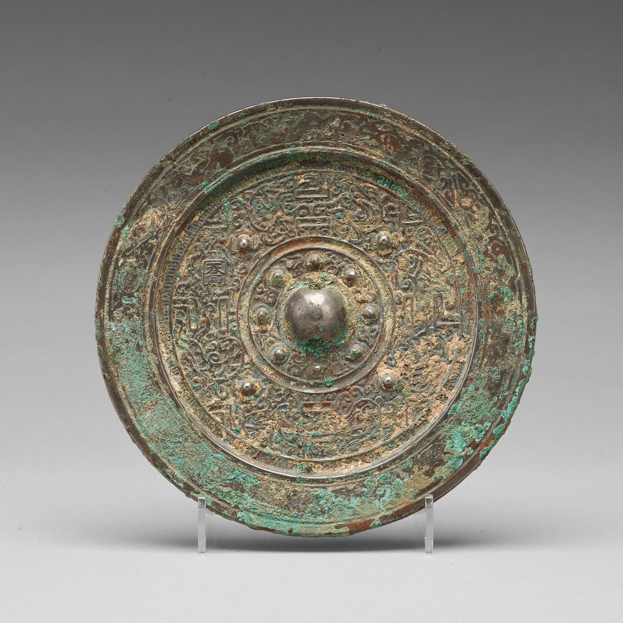 SPEGEL, brons. Handynastin (206 f.Kr.-220 e. Kr.).