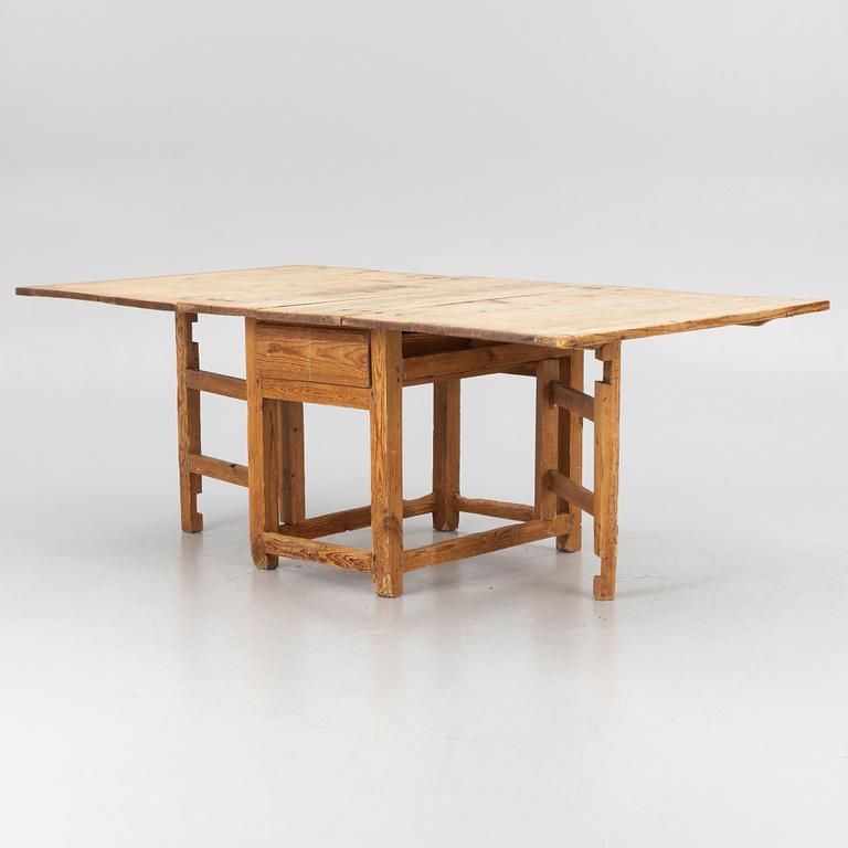 A 19th century gate-leg table.