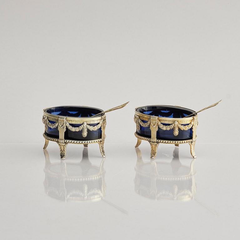A pair of Swedish 18th century silver and blue glass salt cellars, mark of Pehr Zethelius, Stockholm 1775.