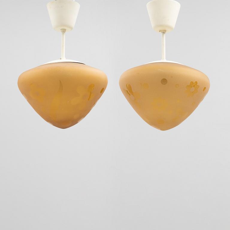 Harald Notini, a pair of ceiling lamps, model "11587" Arvid Böhlmarks Lampfabrik, 1940s.