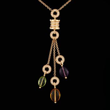 A pendant necklace in 18K yellow gold with peridot, amethyst, blue topaz, citrine quartz and pavé diamonds.