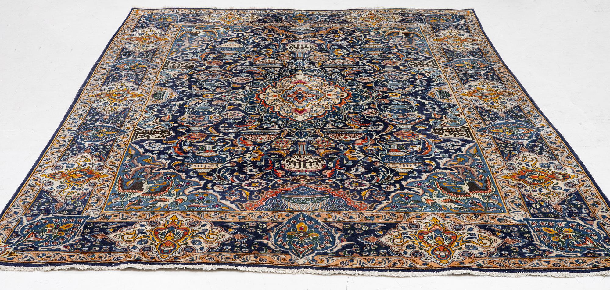 A Kashmar carpet, c. 335 x 242 cm.