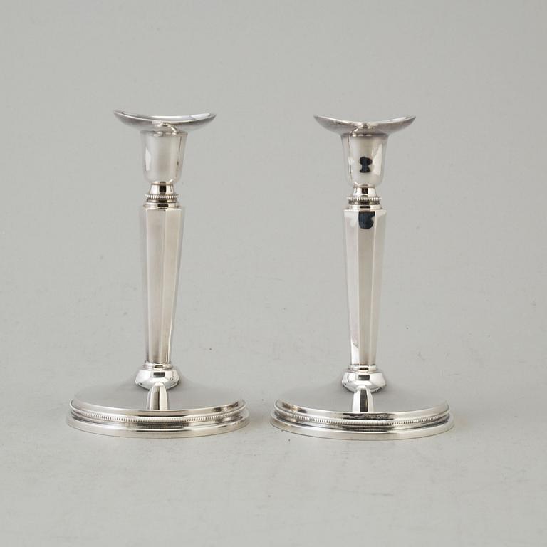 a pair if silver candlesticks by MGAB Uppsala 1962.