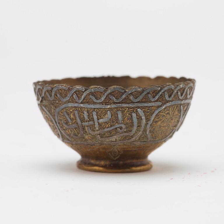 ZARFS, 12 PIECES. Metal. Height ca 3,5 cm each. Iran/Turkey, around 1900 - first half of the 20th century.