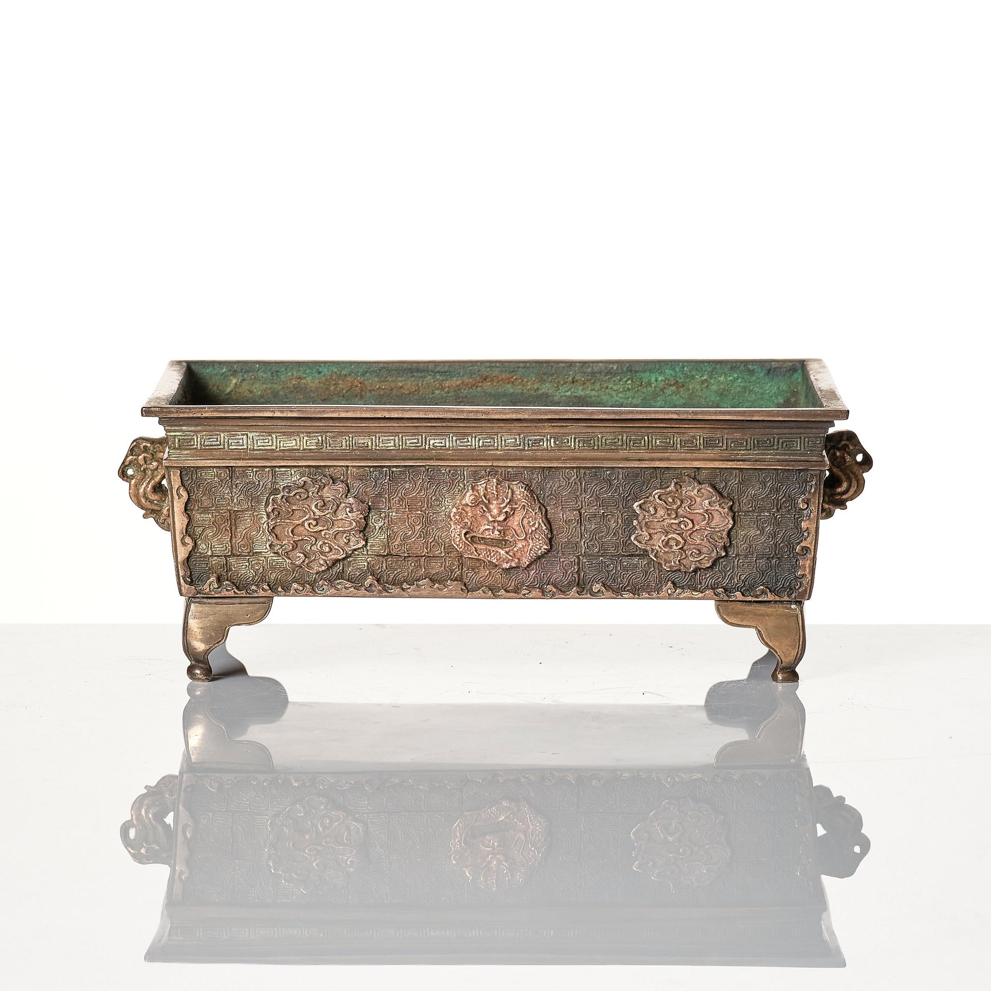 A bronze with silver appliqué censer/flowerpot, 19th Century.