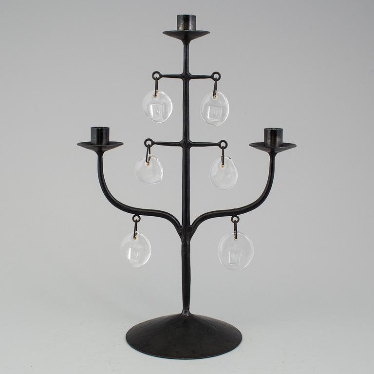 A wrought iron and glass candelabra by Erik Höglund.