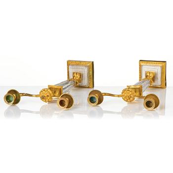 A pair of Empire ormolu and cut glass two-branch candelabra, Paris, early 19th century.