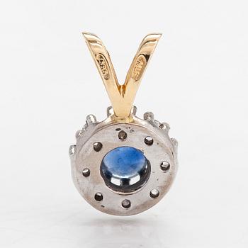 A 14K gold pendant with sapphire and diamonds approx. 0.20 ct in total.