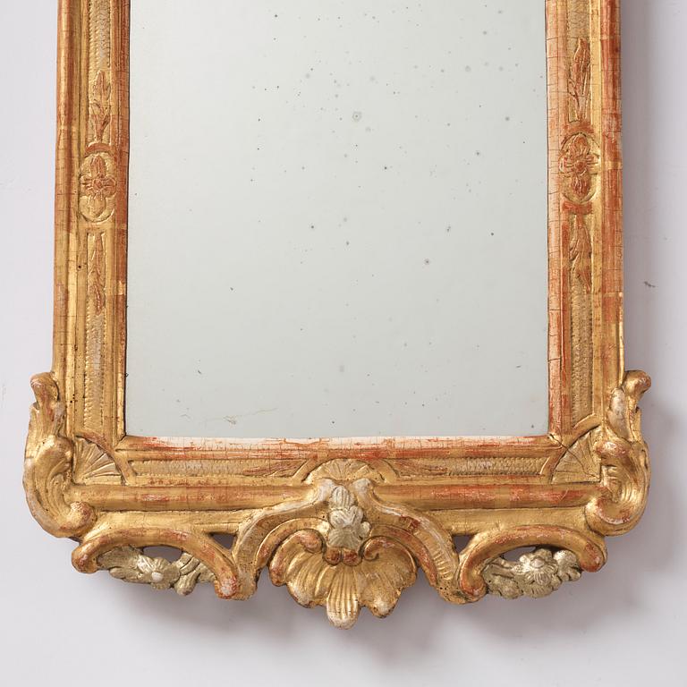 A Gustavian mirror by J Åkerblad (master in Stockholm 1758-1799), 1770s.