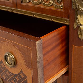 A Gustavian style chest of drawers, mid 20th Century.