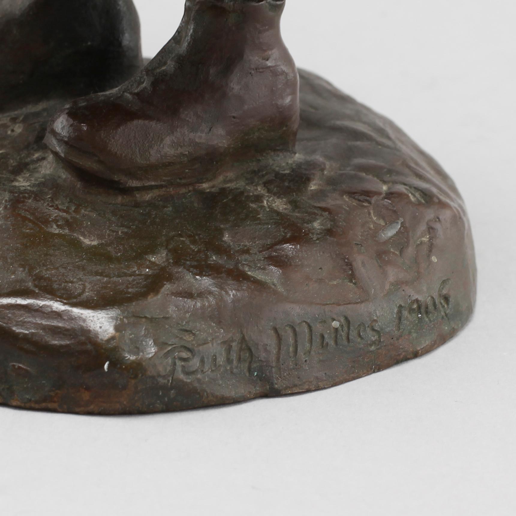 a bronze sculpture, signed and dated 1906.