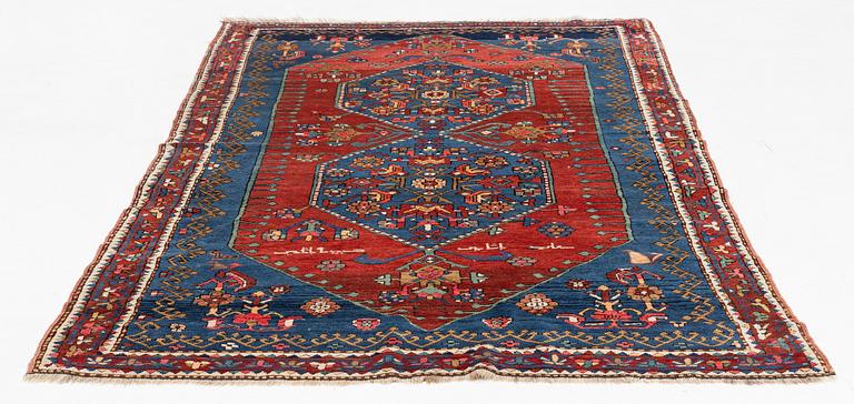 An antique carpet from south caucasus, probably Karabagh, ca 261 x 146 cm.