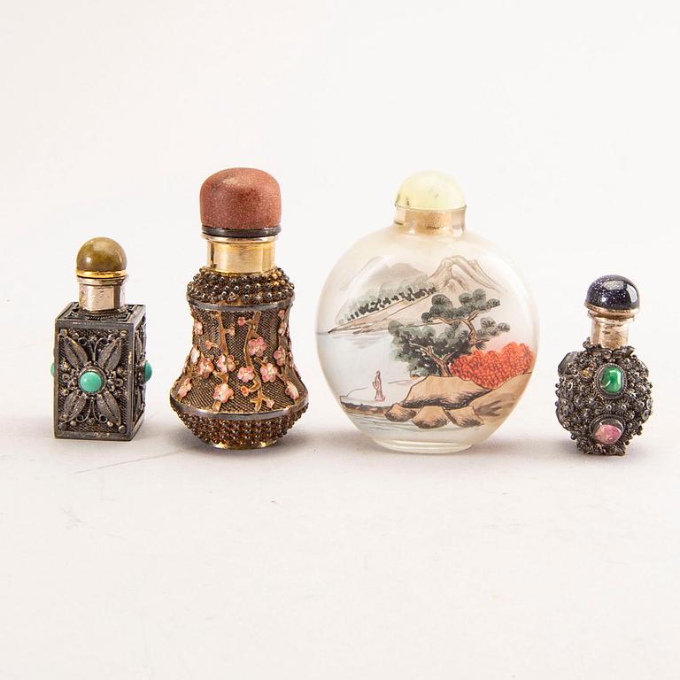 A set of seven different metal and glass snuff bottles 20th century.