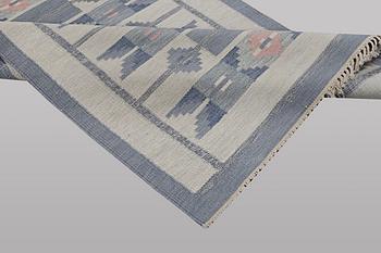 Ingegred Silow, a flat weave carpet, signed IS, ca 197 x 137 cm.