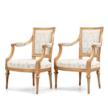 10. Two matched Gustavian late 18th century armchairs.
