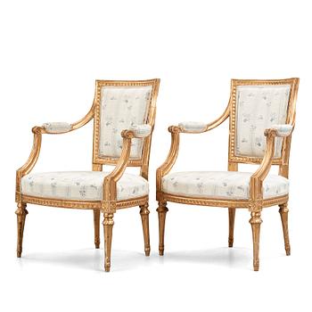 10. Two matched Gustavian late 18th century armchairs.