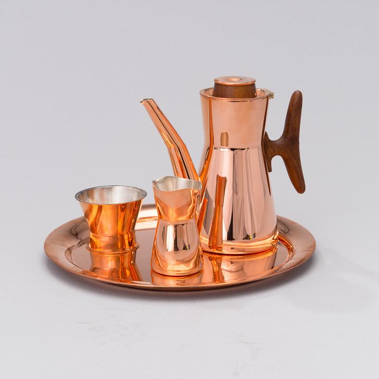 A coffee pot, sugar bowl and creamer on a tray, marked Kultakeskus Oy Design Tapio Wirkkala made in Finland.