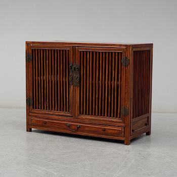 A stained second half of the 20th century cupboard from south-east Asia.