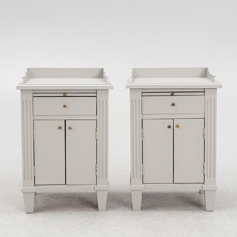 A pair of bedside tables, later part of the 20th century.