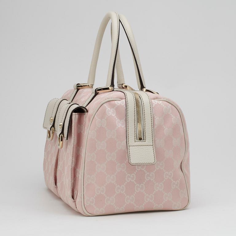 GUCCI, a pink monogram canvas handbag.