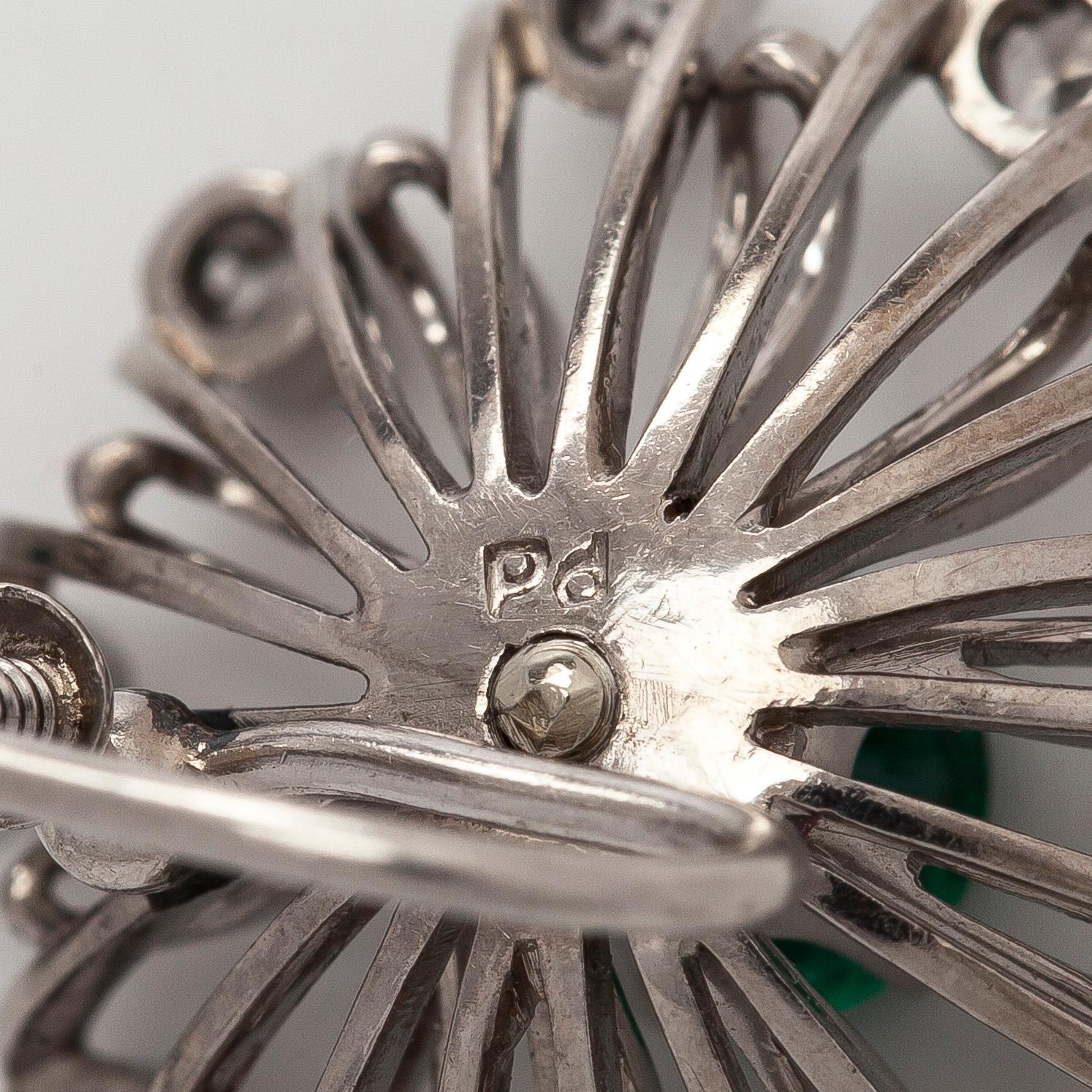 Tillander, a pair of flower earrings in platinum/palladium with octagon-cut diamonds, cultured pearls and emeralds.