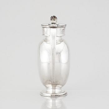 An English silver jug with lid, makers mark Hunt & Roskell Late Storr & Mortimer, London 1881.
