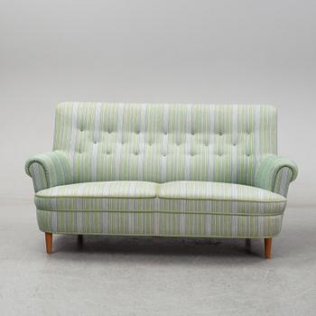 A second half of the 20th Century sofa by Carl Malmsten.