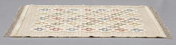 UNKNOWN ARTIST 20TH CENTURY, A CARPET, knotted pile in relief, ca 191 x 163,5 cm, signed at the back S.K.L.H. 1957.