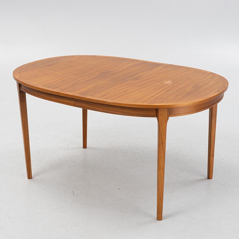 A teak-veneered dining table, second half of the 20th century.