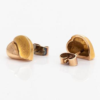 A pair of 14K gold earrings.