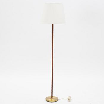 Nordiska Kompaniet, a brass floor lamp, mid 20th century.