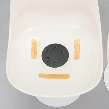 Eero Saarinen, A 'Tulip' furniture set, table with eight chairs, Knoll International, 1970s.