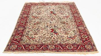 An oriental, figural rug, c. 230 x 145 cm.