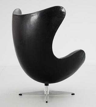 An Arne Jacobsen black leather 'Egg' chair, Fritz Hansen, Denmark 1960's.