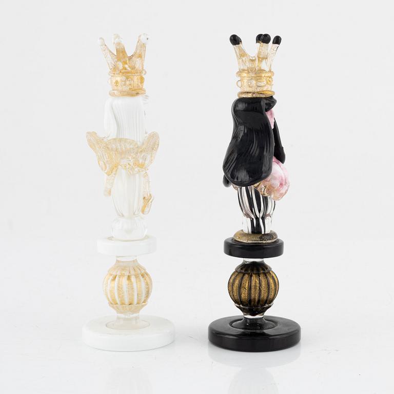 Two glass chess pieces, probably Murano, Italy.