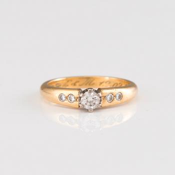 A 18K gold ring with diamonds by Tillander Oy Ab, Turku, Finland 2004.