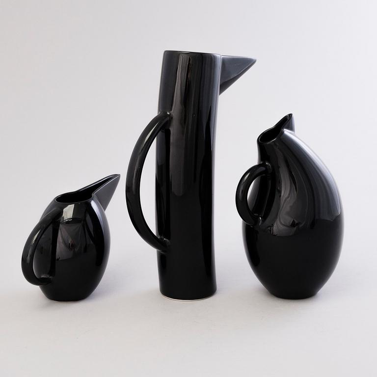 KATI TUOMINEN-NIITTYLÄ Three Black Ceramic Storybirds Jugs by Arabia, Finland, late 20th century.