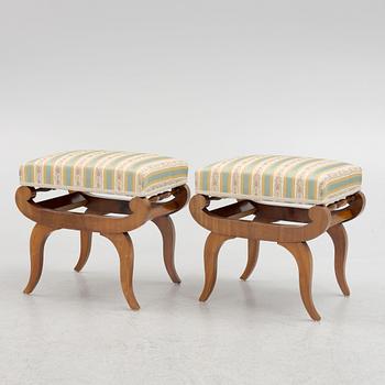 A pair of Karl-Johan ottomans, 19th century.