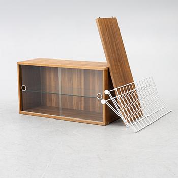 Nils Strinning, a "String" book case with cabinet, Sweden, 21st century.