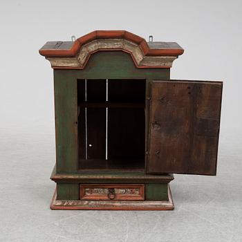 A 18/19th Century painted wall cabinet.