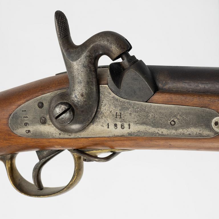 A Swedish 1860 pattern percussion rifle.