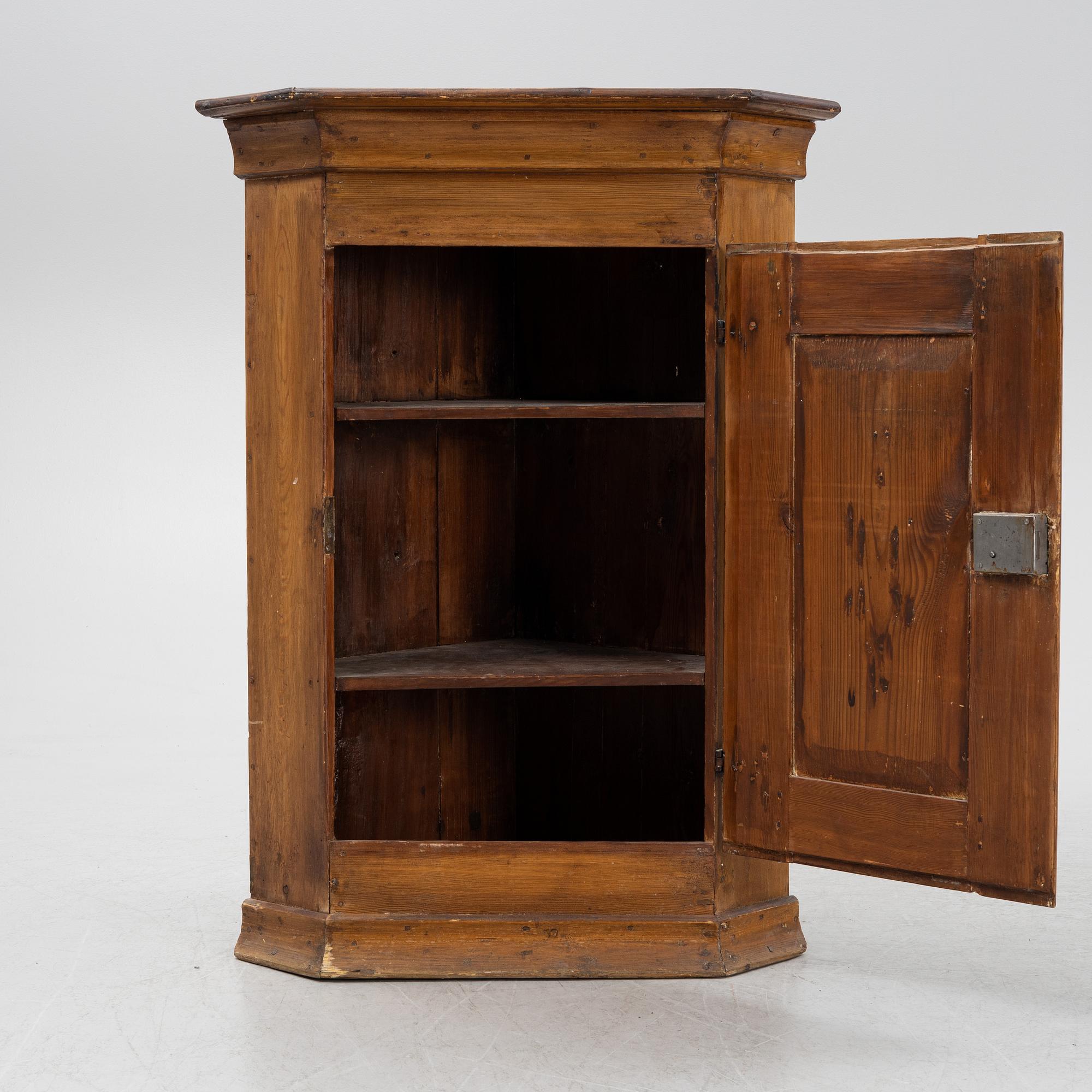 A 18th century corner cabinet.