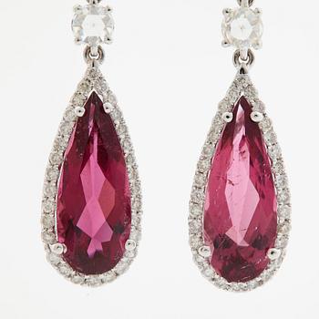 A pair of rubelite and brilliant cut diamond earrings.
