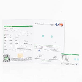 Örhängen platina med cabochonslipade smaragder och gammalslipade diamanter.