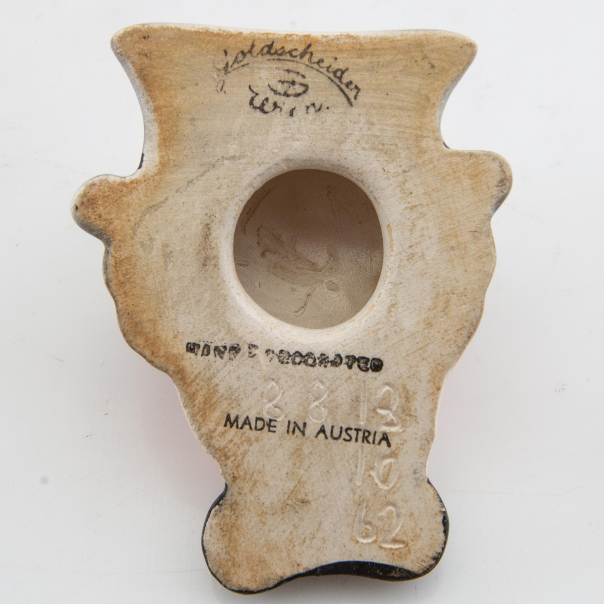 Wall masks 5 pcs including Goldscheider mid-20th century porcelain/terracotta.