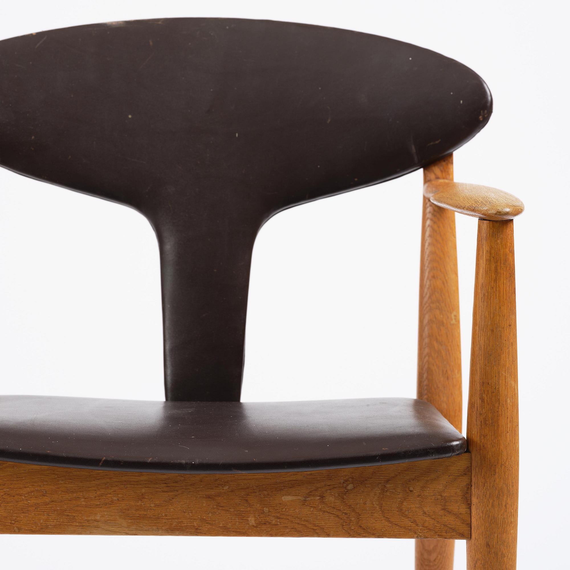 Carl-Axel Acking, attributed, a pair of armchairs, reportedly executed for the municipal council in Åhus, by Åhmans, 1950s.