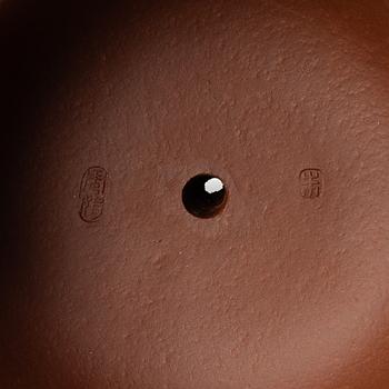 A 'calligraphy' yixing teapot, China, later part of the 1900s.